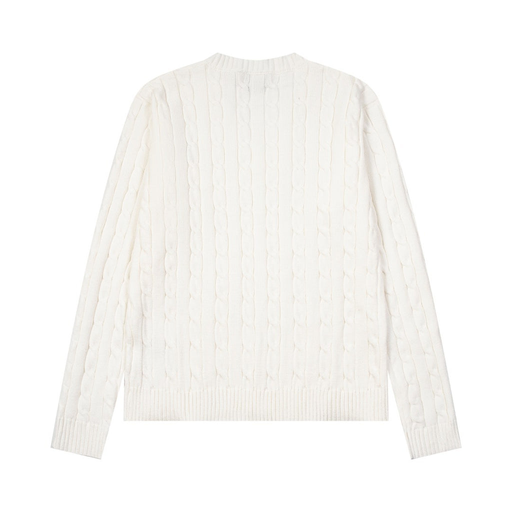 V-neck knitted sweater with twist embroidery